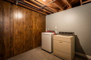Laundry room featuring a washing machine and a dryer.Very roomy for shelves , storage, laundry baskets etc.