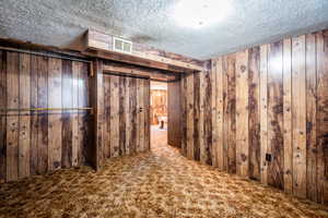Downstairs bedroom with a closet. No door on the closet.