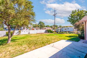 View of the back yard. Fully fenced with a large garden area