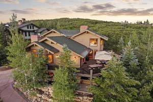 View from above of property featuring a forest