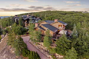 View from above of property with a heavily wooded area