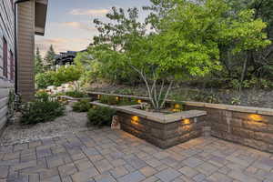 Patio terrace at dusk featuring a patio area
