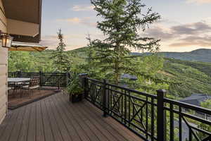 Wooden deck with outdoor dining space