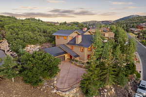 View of subject property with mountains