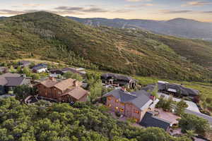 Aerial view at dusk of a mountain view and a residential view