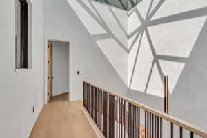 Hallway featuring light wood-type flooring