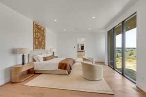 Bedroom featuring recessed lighting and light wood finished floors