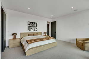 Bedroom featuring recessed lighting and carpet floors