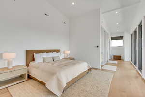 Bedroom featuring light wood-style floors and recessed lighting