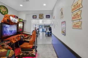 Game room featuring recessed lighting