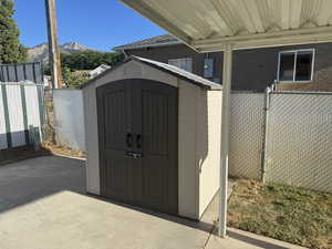 View of shed with a mountain view