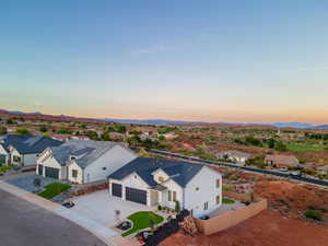 Aerial view at dusk of a residential view and a mountain view