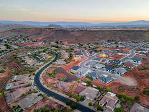 Aerial view at dusk of a mountain view and a residential view