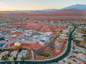 View of property location with a mountainous background and nearby suburban area