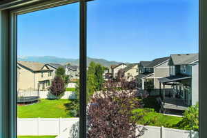 Mountain view featuring nearby suburban area