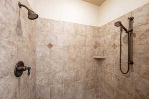 Bathroom view of tiled shower