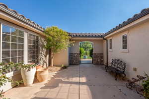 View of patio / terrace featuring a gate