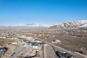 View of mountain backdrop with nearby suburban area