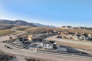Aerial view of residential area with a mountainous background