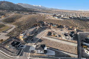 View of property location with nearby suburban area and a mountainous background