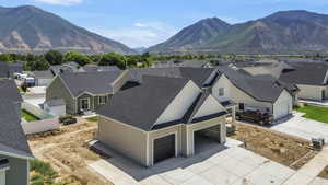 Aerial view of residential area with a mountain backdrop