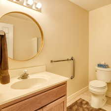Bathroom with vanity and light tile patterned floors