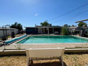 View of swimming pool featuring a patio