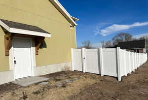 View of side of home with stucco siding
