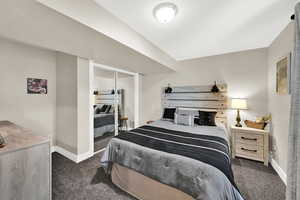 Bedroom featuring a closet and carpet