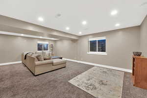 Family room area featuring carpet floors and recessed lighting