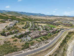 Aerial view of residential area featuring a mountain backdrop
