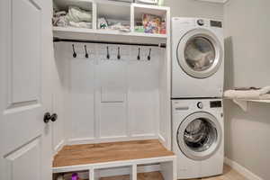 Laundry area with stacked washer / dryer