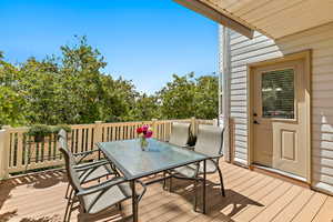 Wooden deck with outdoor dining space