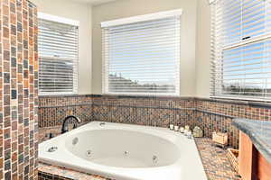 Bathroom featuring a whirlpool tub