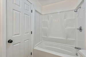 Bathroom with bathing tub / shower combination