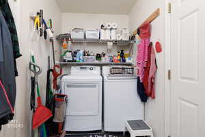 Laundry room with washer and dryer