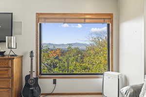 Gorgeous views of the valley, city and Oquirrh mountains from the primary bedroom.
