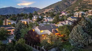 Aerial view at dusk of a mountain view and a residential view