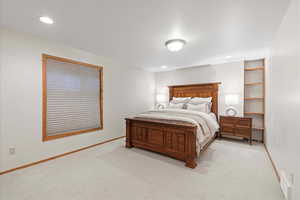 Secondary Bedroom in Basement with carpet floors and recessed lighting