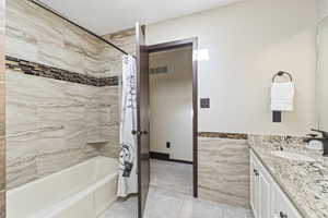 Updated Full bathroom with double sinks and skylight.