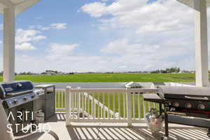 View of patio / terrace featuring a view of rural / pastoral area and a grill