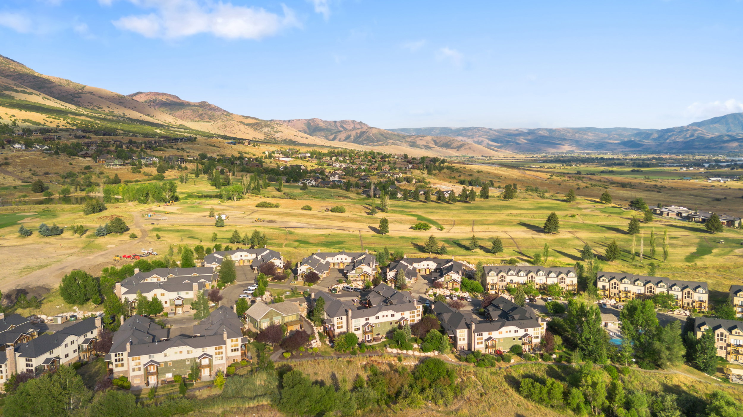 View of property location with nearby suburban area and a mountainous background