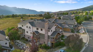 Aerial perspective of suburban area with mountains