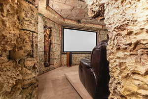 Cinema room with carpet flooring