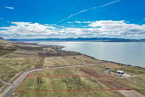 Overview of rural landscape featuring a water and mountain view and property boundaries highlighted