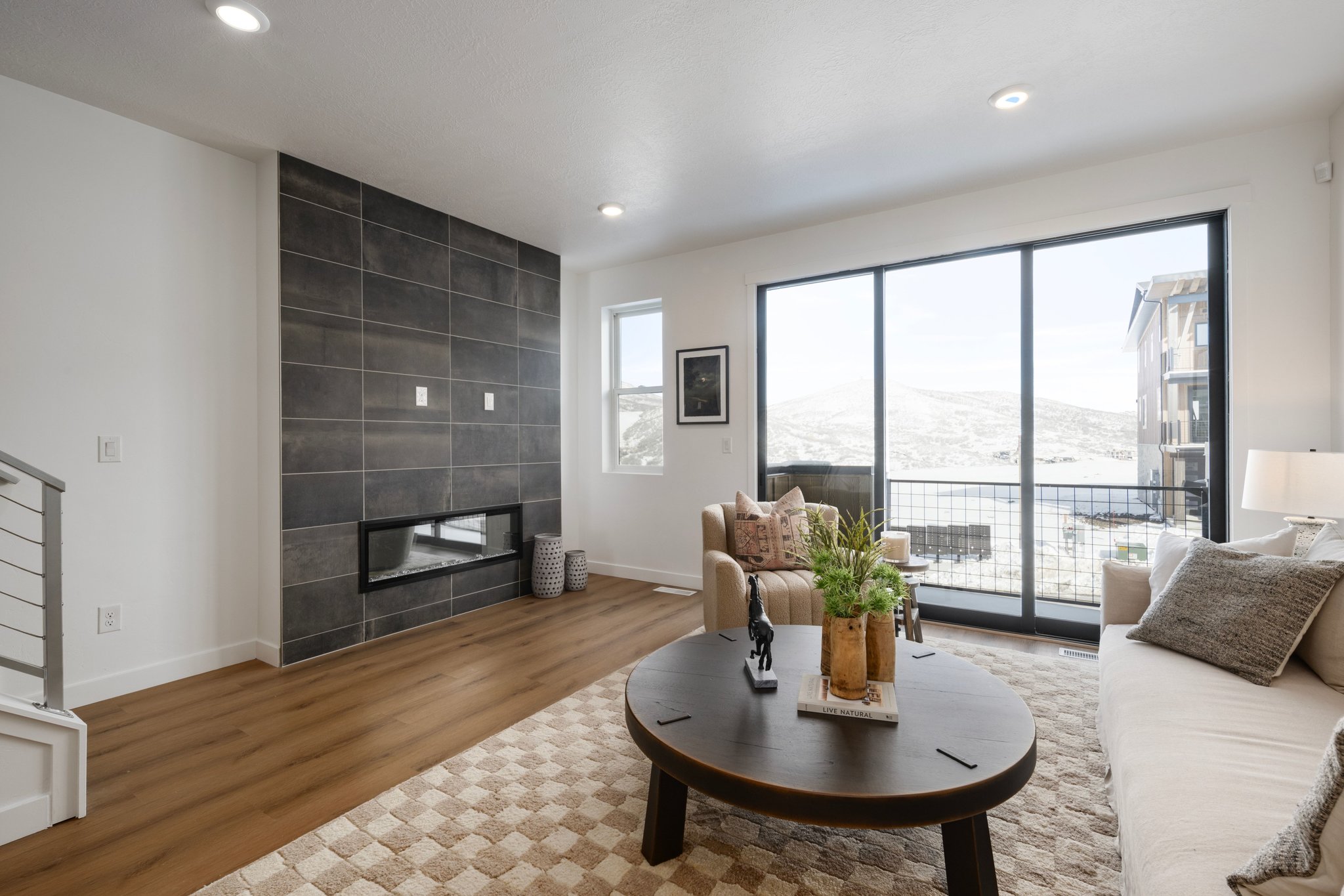 The heart of the home with large windows, great flow, and a vibe that's both relaxing and stylish. *model home