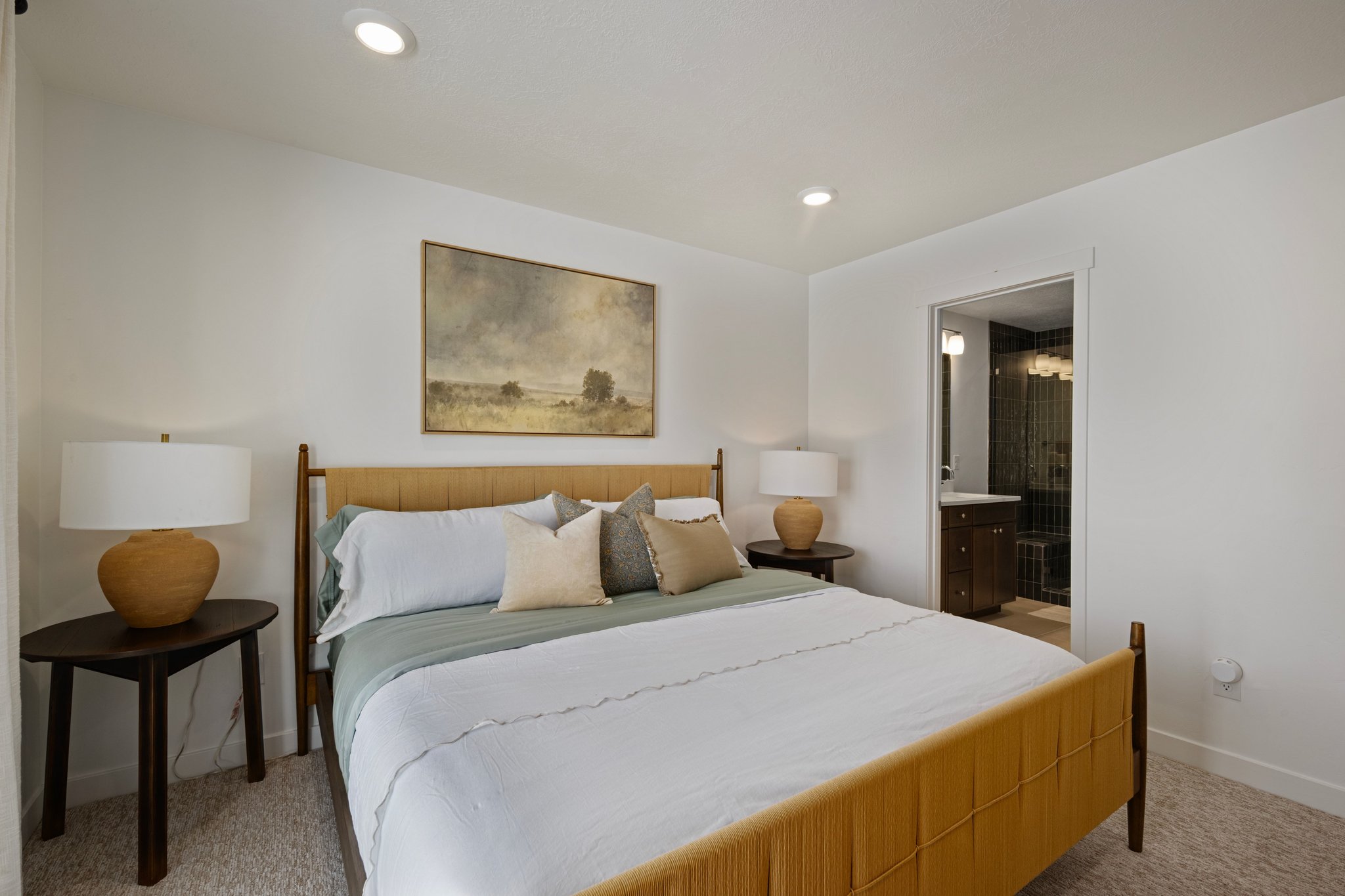 A true suite escape-this bedroom brings all the cozy vibes without sacrificing style. *model home