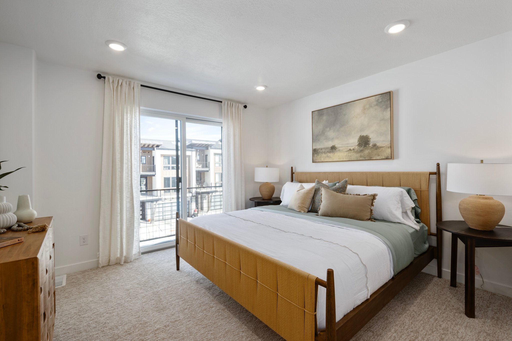 A true suite escape-this bedroom brings all the cozy vibes without sacrificing style. *model home