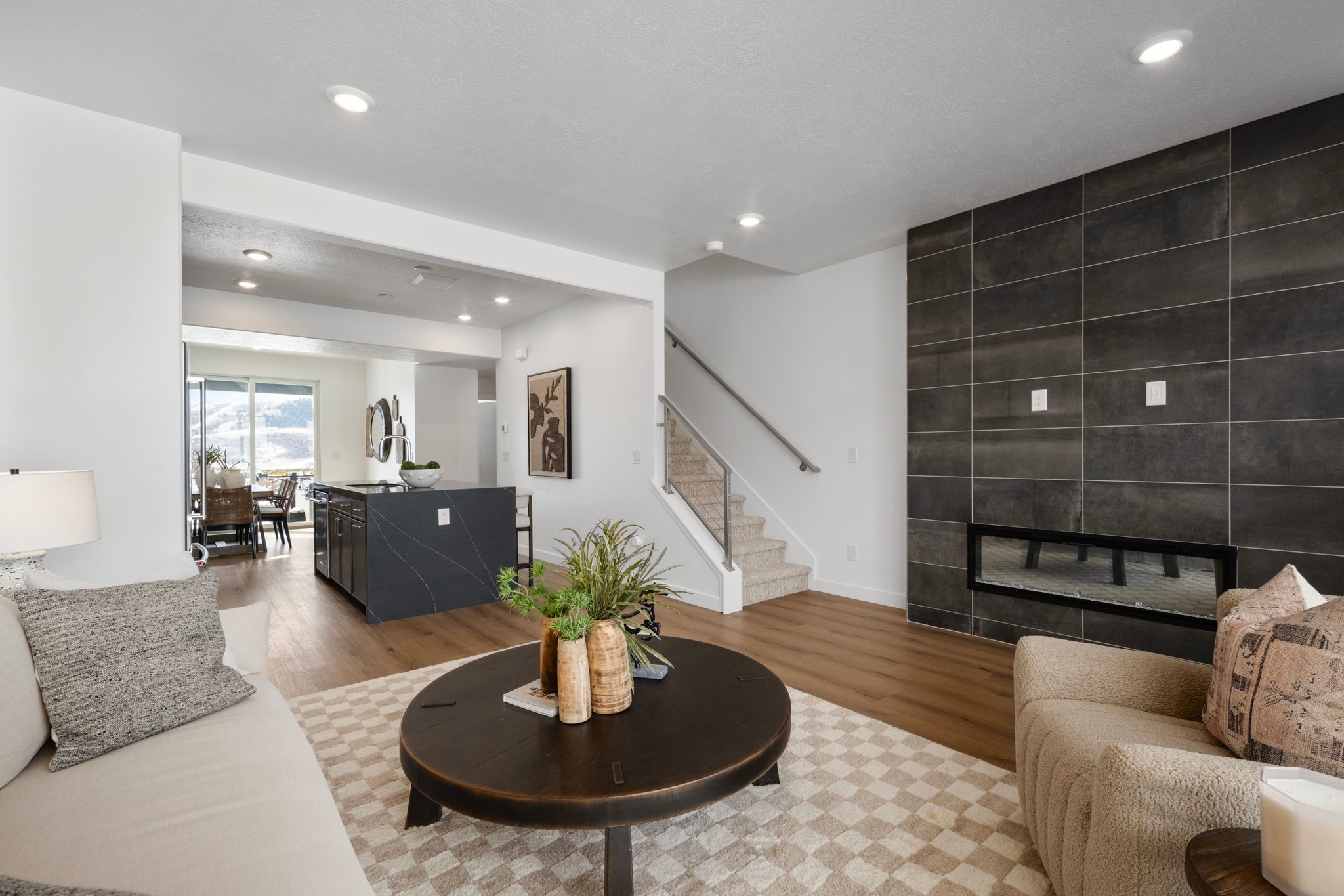 Wide open layout + massive windows = instant happy vibes.*model home