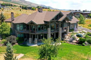 Build with integrity and quality.  View of the front. Every tree and bush carefully planned out with native growth. Fire protection in mind.